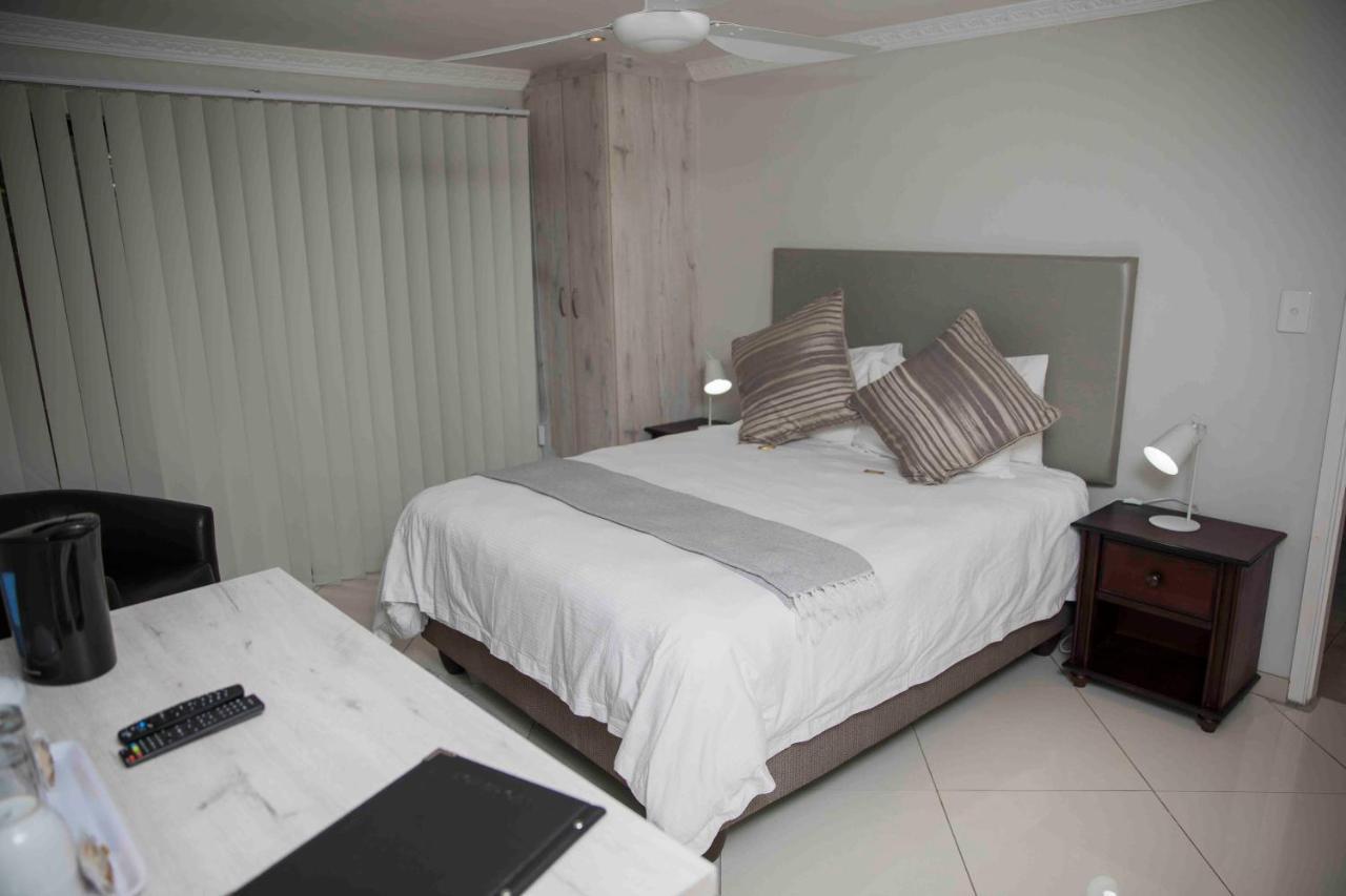 Palmwood Guesthouse อมันซิมโทที ภายนอก รูปภาพ